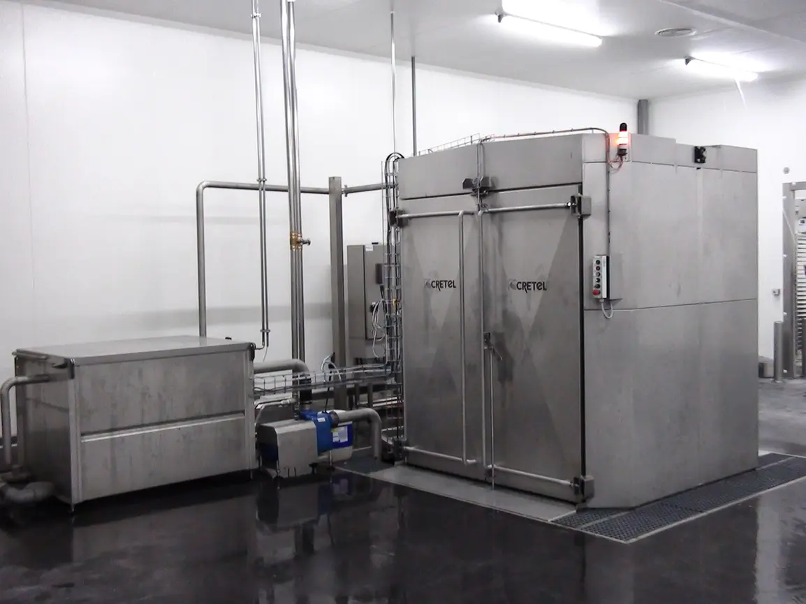 Laveuse pour chariots, système de lavage industriel